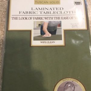 Spill proof sage green round tablecloth, seats 4-6